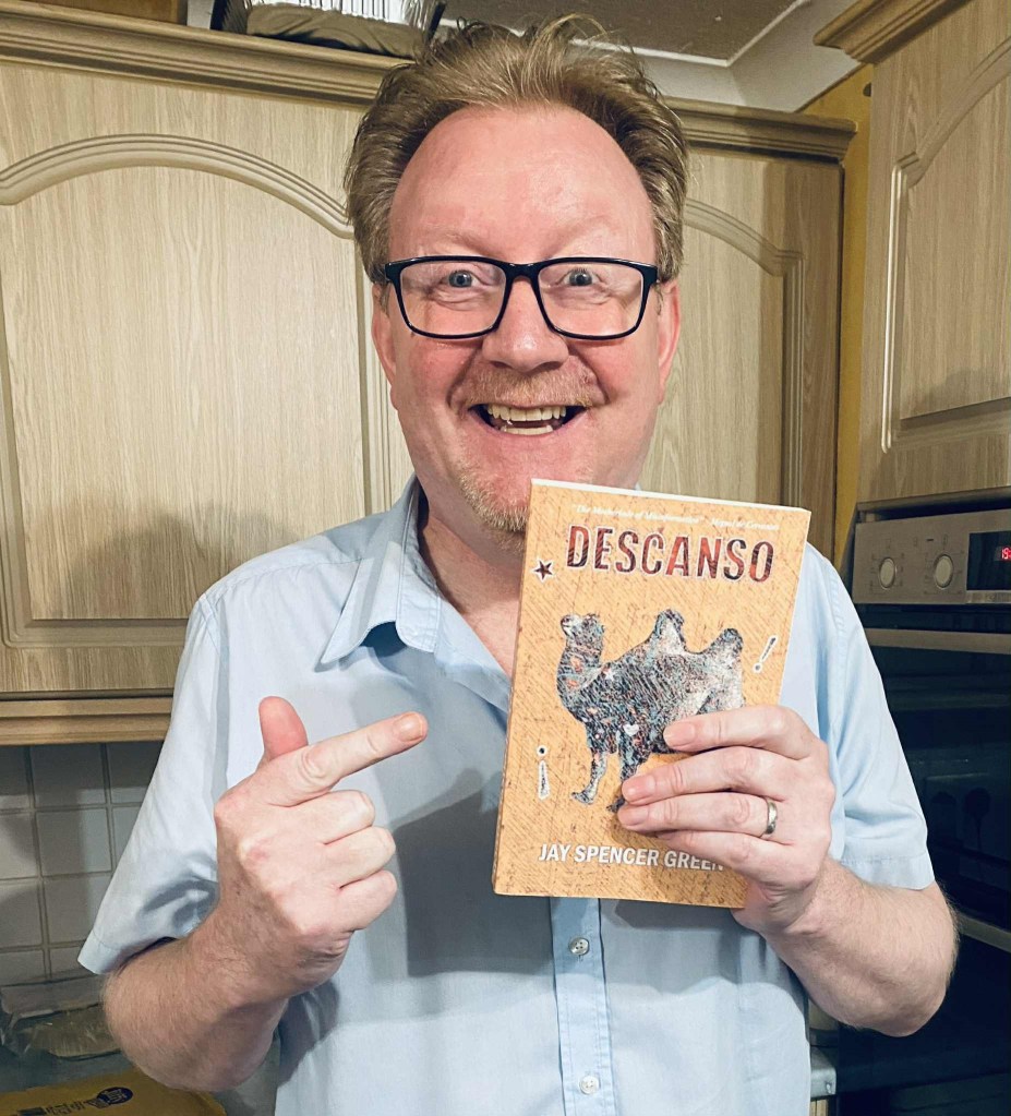 A photo Steve in Solihull holding a copy of Descanso.